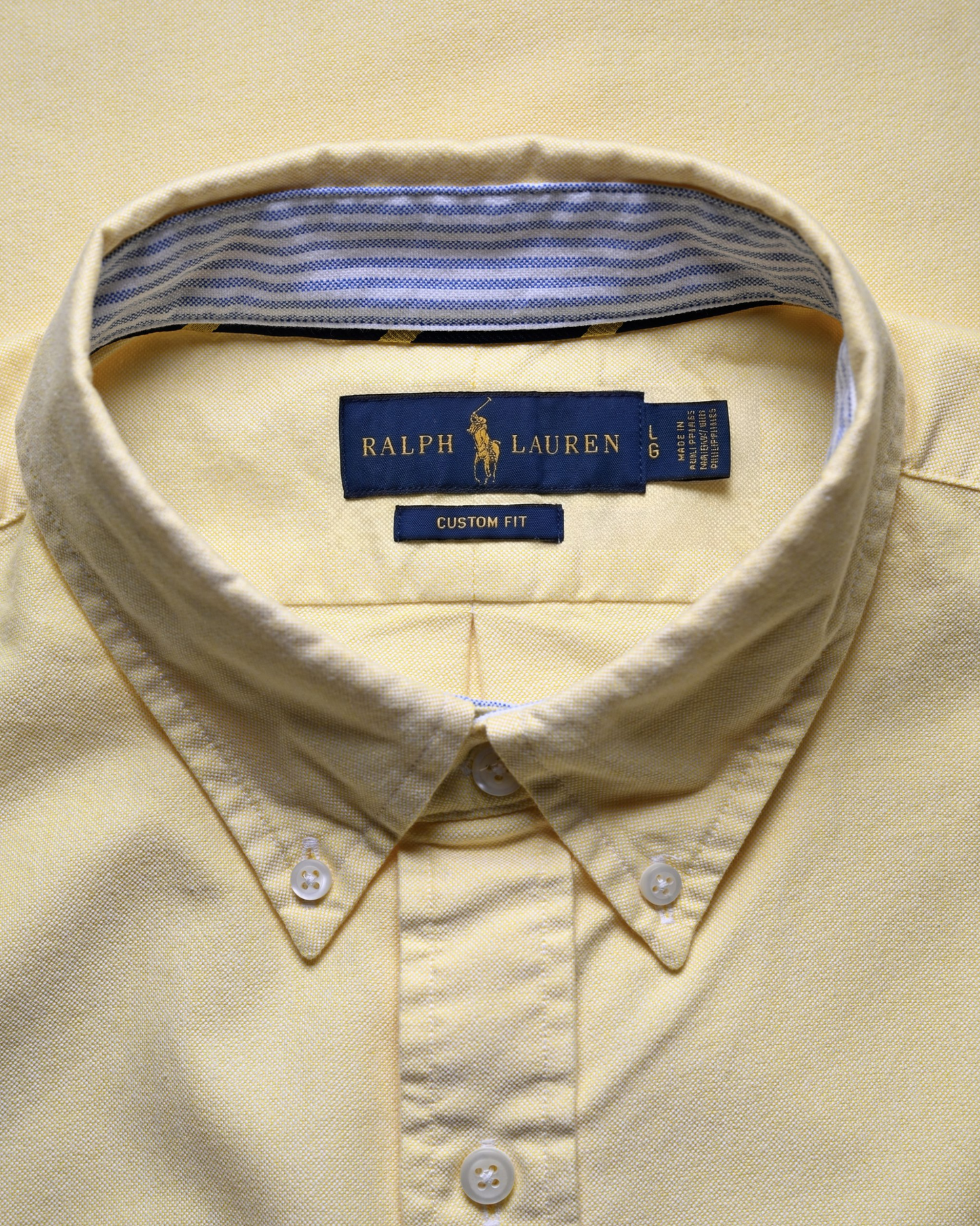 Button down collar detail on vintage Ralph Lauren yellow oxford shirt