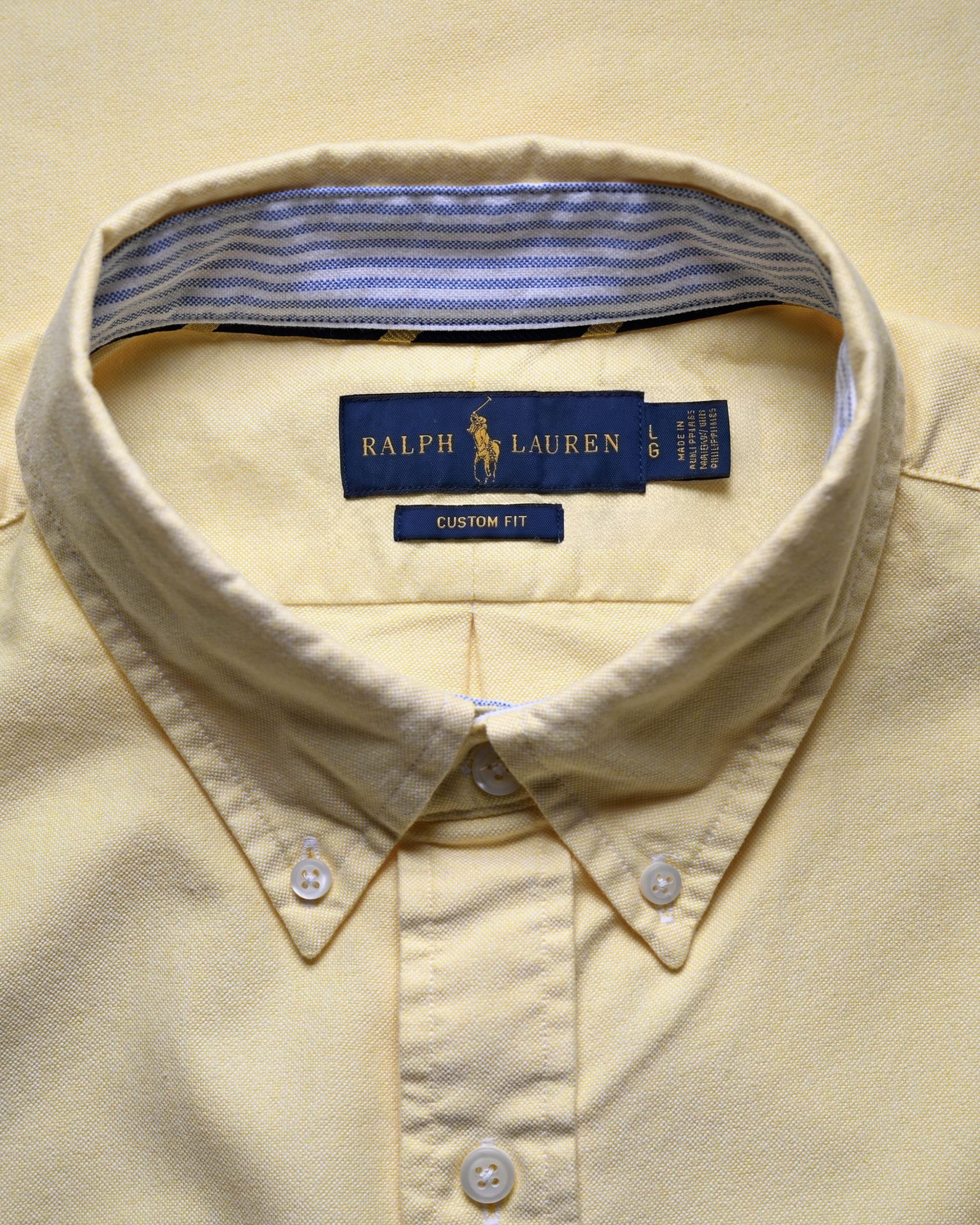 Button down collar detail on vintage Ralph Lauren yellow oxford shirt