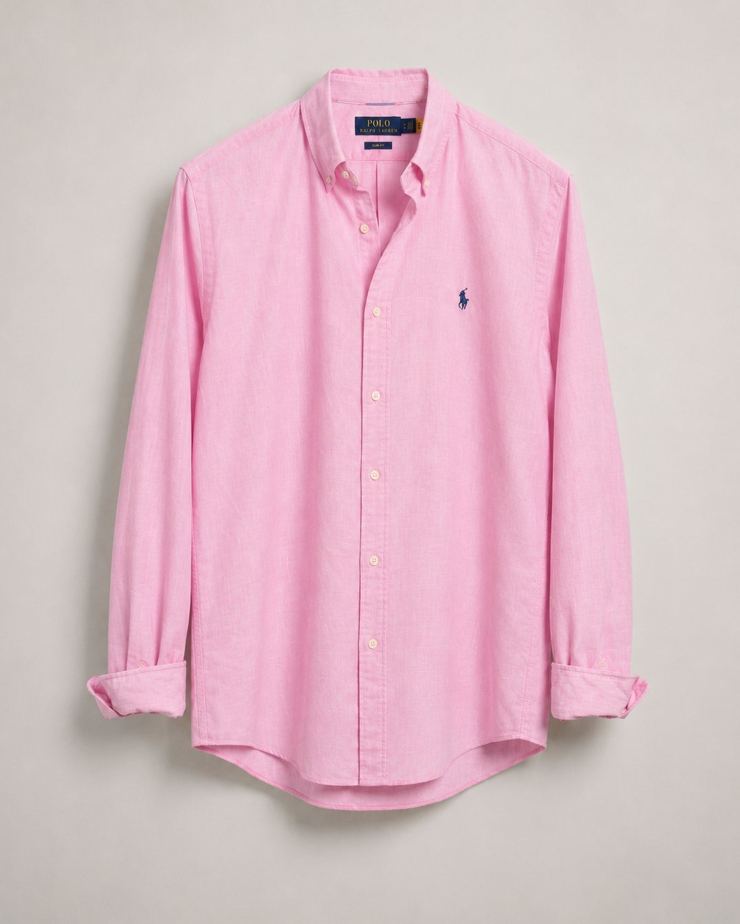 Vintage Hamptons Pink button-up linen shirt oversized slim fit with a navy logo on a light gray background 